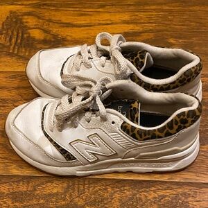 New Balance 997H sneaker with a leopard print accent.